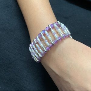 Purple and white beaded bracelet.